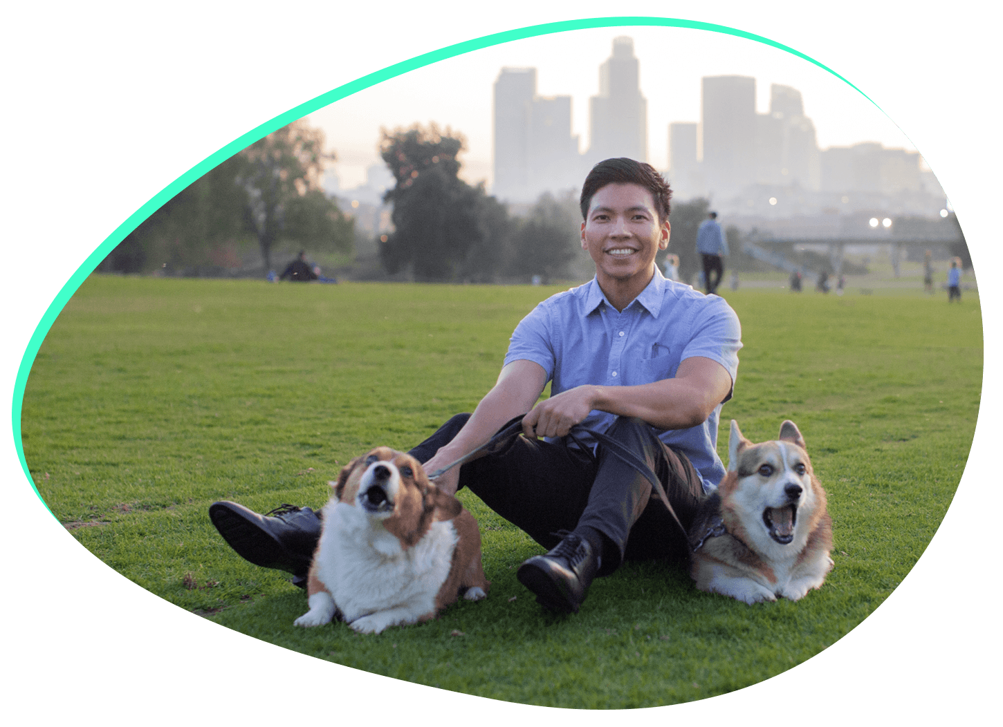 Kenneth Mejia with his two corgis.